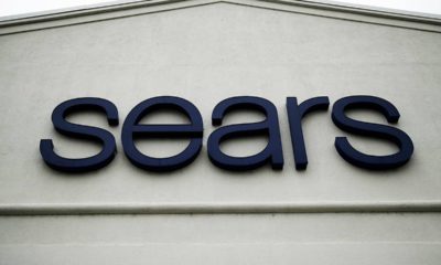 Photo of a sign for a Sears Outlet