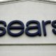 Photo of a sign for a Sears Outlet