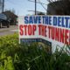 Photo of a sign that says "Save the Delta"