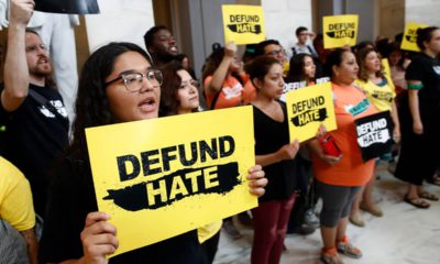 Photo of protestors gathering to defund border protection