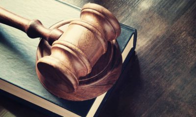 Photo of a judge's gavel and book