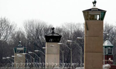 Photo of guard towers and razor wire in Terre Haute, Ind.