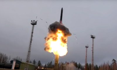 Photo of an intercontinental ballistic missile lifts off from a truck-mounted launcher somewhere in Russia