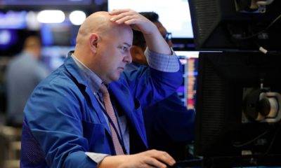 Photo of a trader working on the floor of the New York Stock Exchange