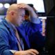 Photo of a trader working on the floor of the New York Stock Exchange