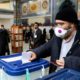 Photo of a voter casting his ballot in Iran