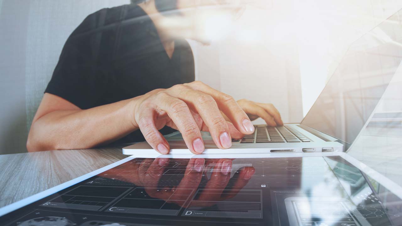 Photo of a woman using a laptop