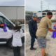 Photo of Elijah Daniel handing out supplies to LA's homeless population