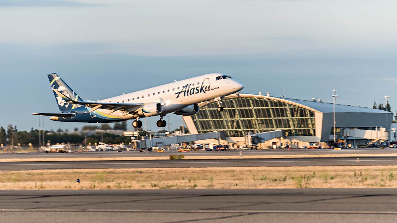 Photo of an Alaska Airlines jet taking off at Fresno Yosemite International Airport