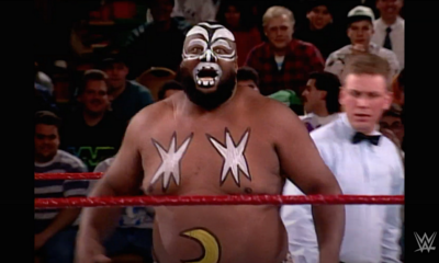 Photo of professional wrestler James "Kamala" Harris in the ring with a referee